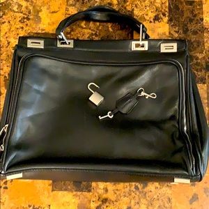 LANCEL Paris black leather bag.